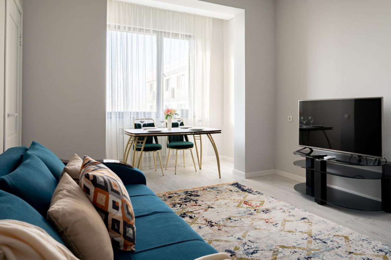 Apartment оазис в центре города: комфорт и уют в жилом комплексе бизнес класса. *